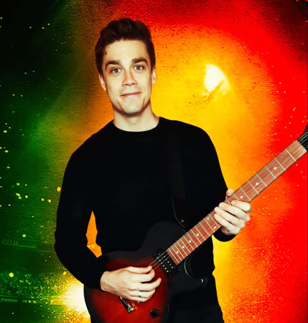 Studio portrait of a young man playing an electric guitar with a colorful abstract background, professional music event photography.