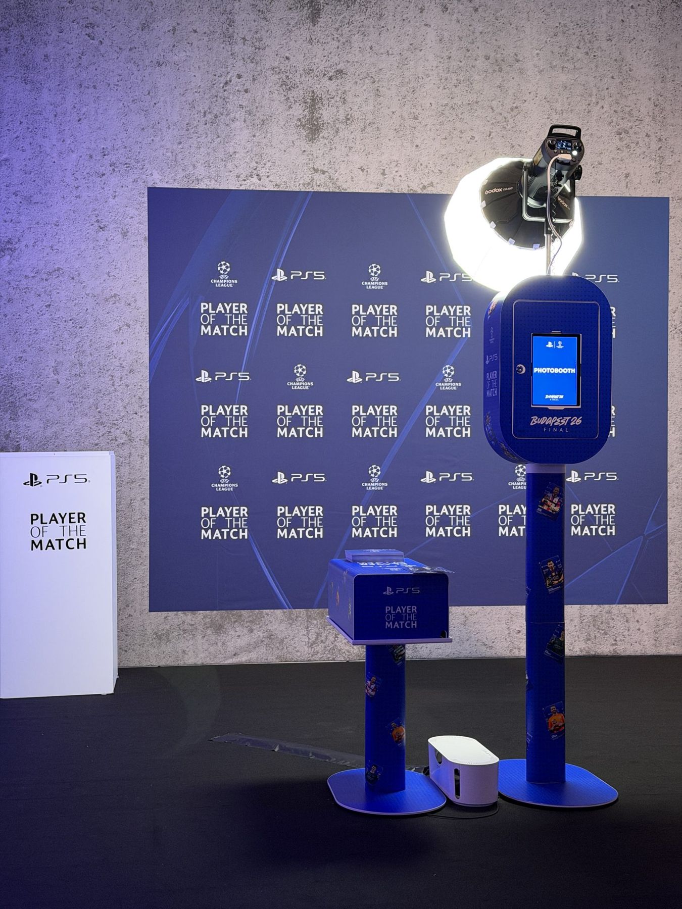 PlayStation branded photo booth with lighting and Player of the Match backdrop, set up for the UEFA Champions League Final in Budapest