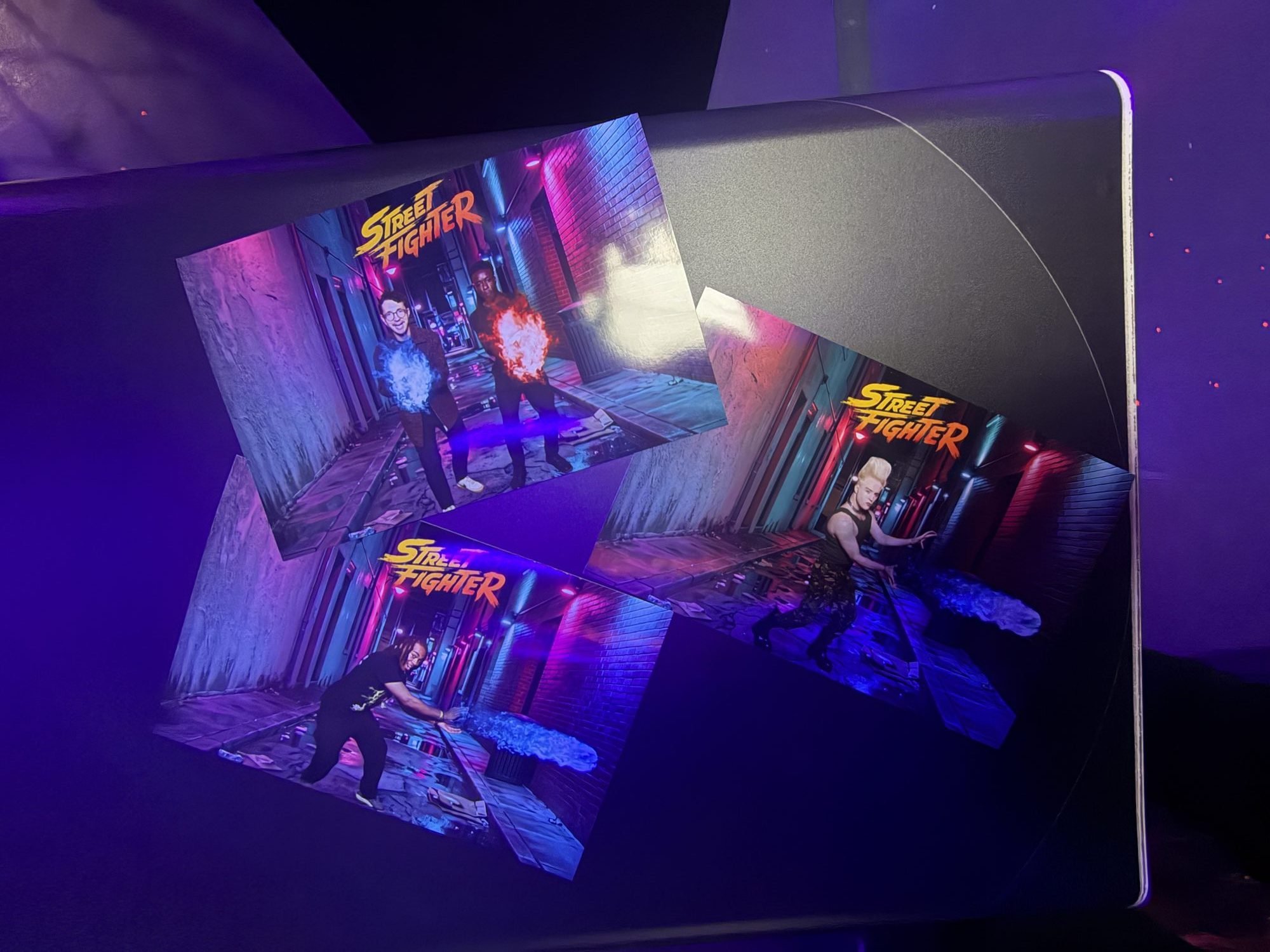 Printed Street Fighter AI photo booth pictures from the movie launch party at NQ64 Soho